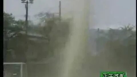 Tornado forming right on a soccer field with playing kids in Japan
