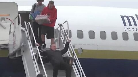 SENATOR TOMMY TUBERVILLE FALLS DOWN THE STAIRS GETTING OFF AIRPLANE