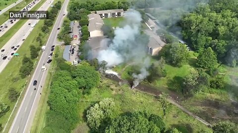 Drone footage taken moments after plane crash during Michigan air show