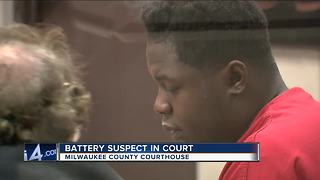 Battery suspect in court after hitting officers