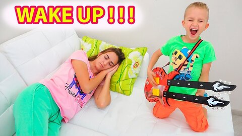 Vlad and Nikita pretend play music and wake up Mom