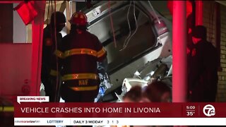 One injured after a car crashes into a home in Livonia, police say