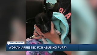 Woman arrested for abusing puppy