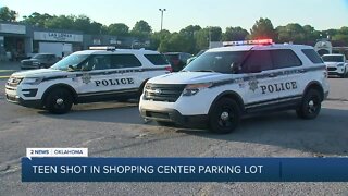 Teen shot in shopping center parking lot