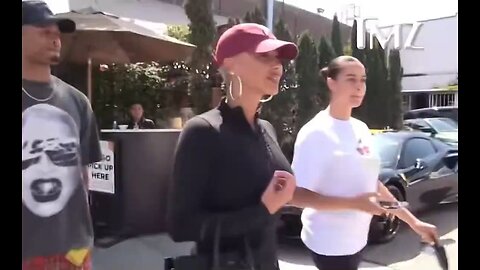 Amber Rose lashes out at a TMZ reporter, declaring, "We are voting for Trump”