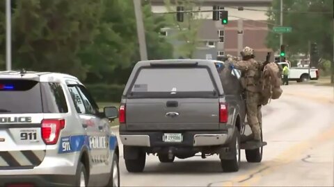 Aerial view of Highland Park 4th of July parade shooting, manhunt for the Rooftop shooter