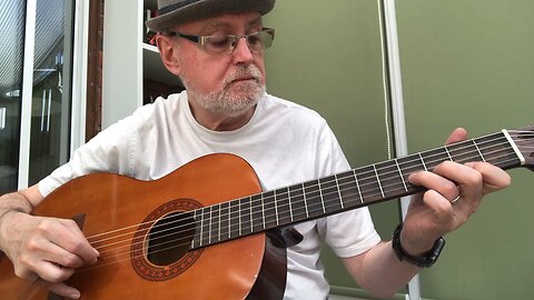 Playing a classical guitar with a reesha or oud pick 2.