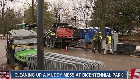 Workers Clean Up Muddy Bicentennial Park