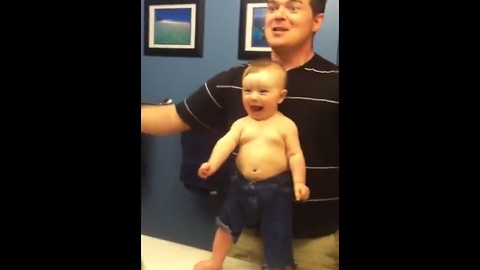Adorable Baby Flexes Muscles With Dad In Front Of Mirror