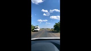 Attack Helicopter low pass over road