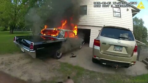 Deputy pulls burning car away from home