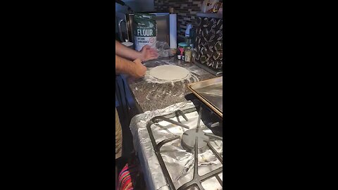 Preparing a pizza to try out my new Gyber Pizza Oven