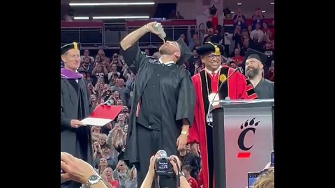 Travis Kelce Receives A Diploma Stone Cold Steve Austin Style
