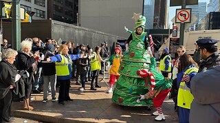 Macy’s Thanksgiving Day Parade NYC Christmas tree stilt walkers