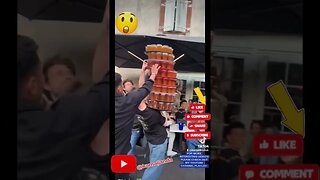 Hilarious Waiter Mishap: 100 Beers Spilled as Tower of Trays Wobbles!