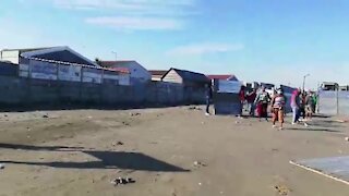 SOUTH AFRICA - Cape Town - Joe Slovo Community member invade open lady (Video) (au5)