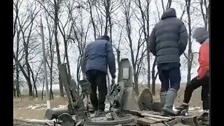 Ukrainian Civilians Inspect Abandoned Russian Tank