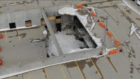 Parking structure collapse: Crews melting snow to get to cars stuck in rubble