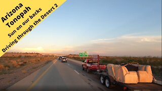 Arizona Tonopah Driving in the desert with the sun setting at our backs 2