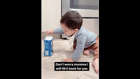 14 months old trying to fill the container back