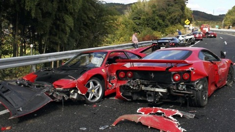 Truck Carrying 9 Exotic Cars Overturns Near Paris