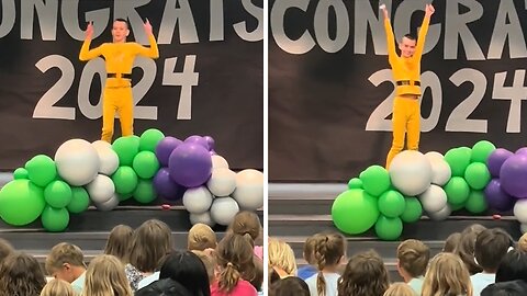 School cheers as autistic boy performs Goofy Movie dance in talent show