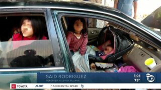Eight children found living in car
