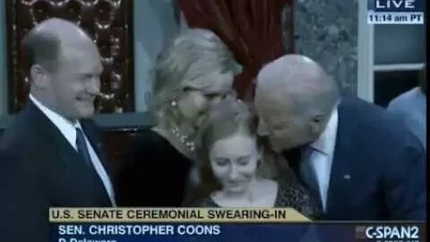 Joe Biden kisses Chris Coons' Daughter
