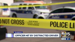 Phoenix officer hit by distracted driver