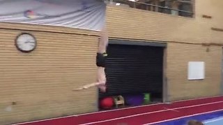 Young Gymnast Shows His Talent By Doing A Usual Gymnastic Routine
