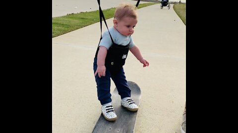 Baby learning how to Skateboard