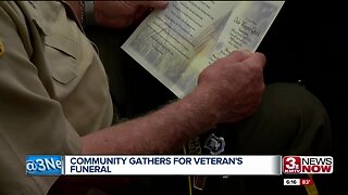 Community gathers for veteran's funeral