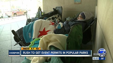 People wait in line in near-freezing temps to get married at a Denver park