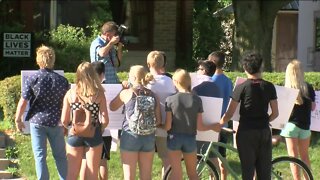 Crowd marches to Mayor Tom Barrett's home to call for in-person classes