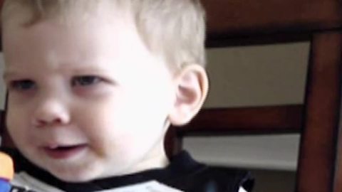 "Toddler Gives Parents Evil Eye"