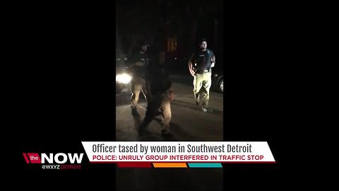 Police officer tased by civilian