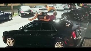 Young man falls from roof and lands on car!