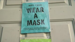 Local businesses hesitant to ditch mask requirements, despite CDC guidance