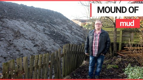 Enormous 25ft high pile of soil appears behind enraged resident's houses