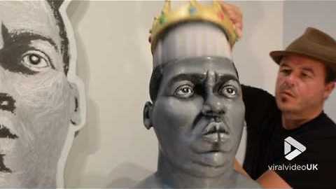 Sculptor Demonstrates Stretchable Paper Sculpture Of The Notorious B.I.G.