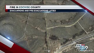 Fire shuts down road near Tombstone, threatens home
