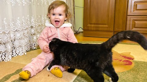 Cute Baby and Hungry Kitten