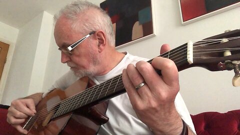 Playing a classical guitar with a reesha or oud pick 8