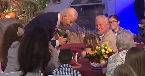Biden Compliments Girls' Ears During 'Friendsgiving' Meal for Service Members