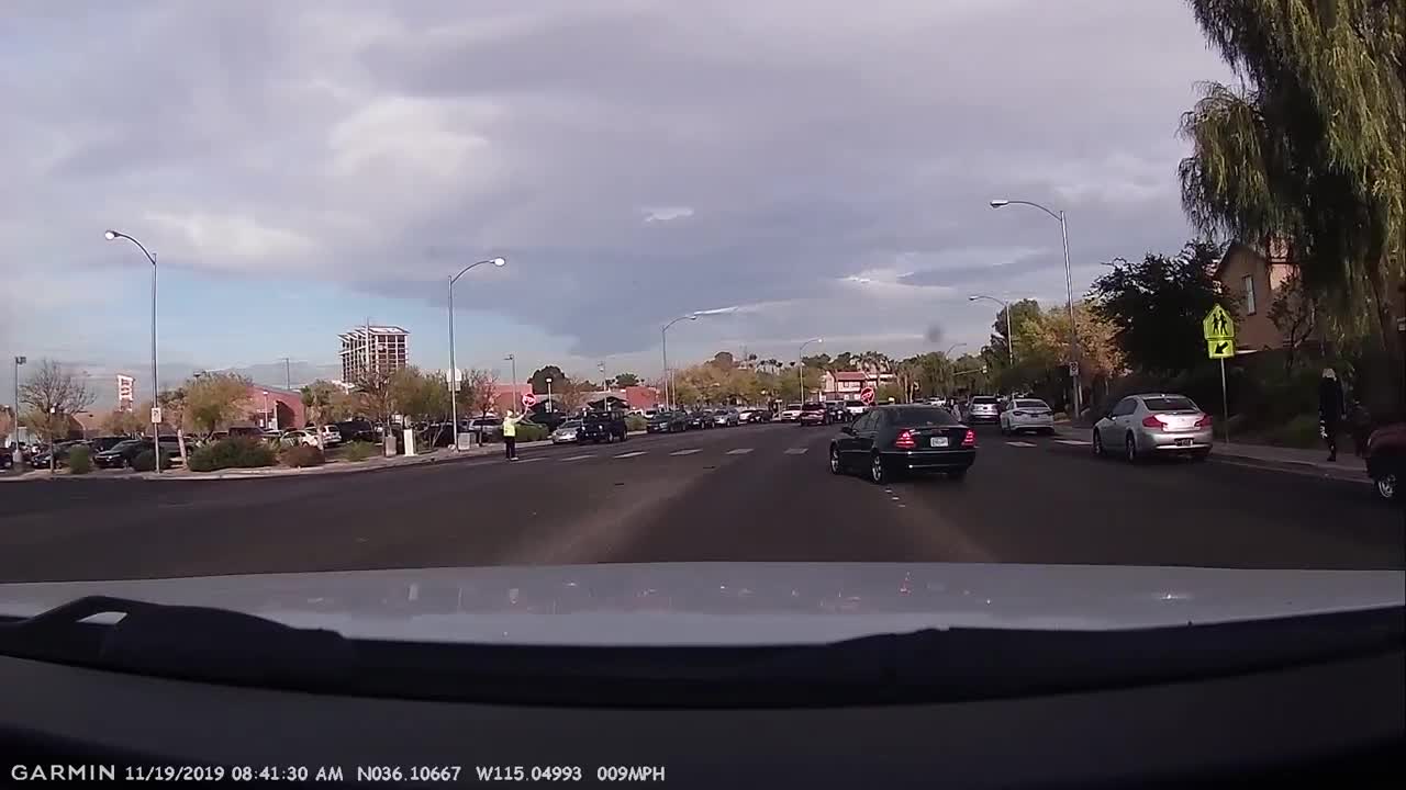 Car almost hits kids in Vegas crosswalk