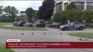 Police say 18-year-old shot outside a hotel
