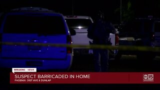 Suspect barricaded in home near 31st Avenue and Dunlap