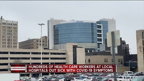 Hundreds of health care workers at local hospitals out sick with COVID-19 symptoms