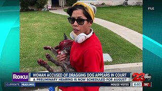 Woman accused of dragging dog behind scooter appears in court