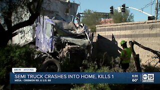 Latest after a semi-truck crashed into a home killing one person